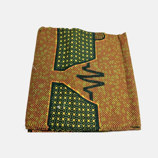 Folded 6-yard Chain of Destiny Ankara fabric featuring yellow chain links on deep green panels and orange woven background.