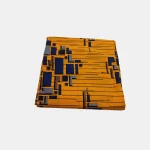 Folded 6-yard piece of Urban Grid Sunset Ankara fabric featuring geometric blocks on a golden yellow background.